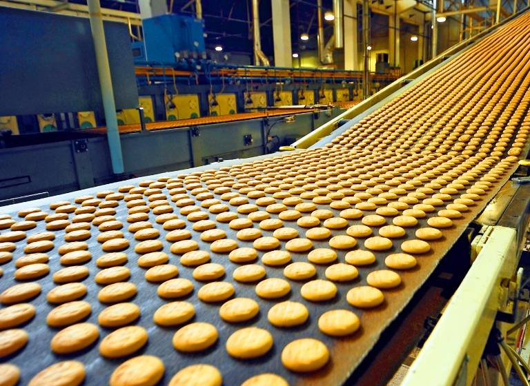 Factory belt with cookies on it